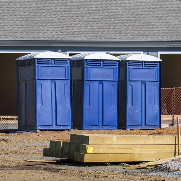 what is the cost difference between standard and deluxe porta potty rentals in Hillsdale